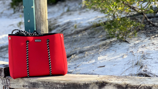 Essentials to Pack in Your Neoprene Swim Bag